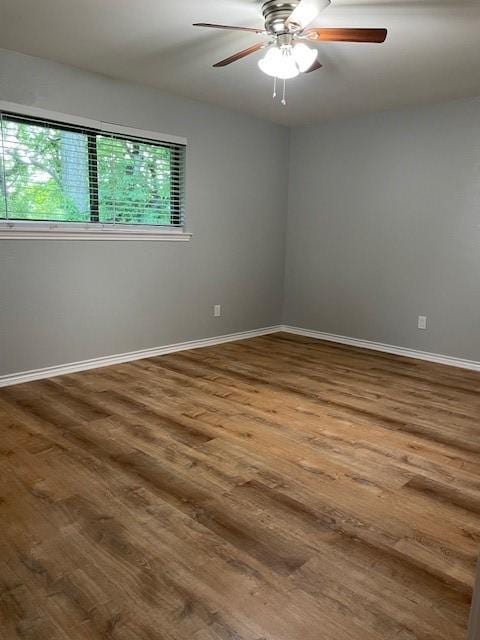 1942 S Lakeshore, Rockwall, TX 75087 - empty room featuring wood finished floors and baseboards