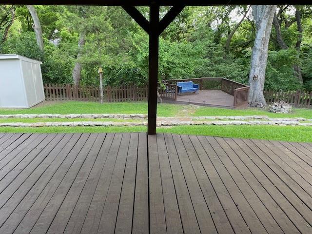 1942 S Lakeshore, Rockwall, TX 75087 - wooden terrace featuring an outdoor structure