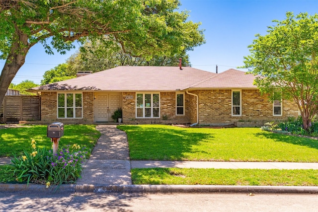 ranch-style home with brick siding
