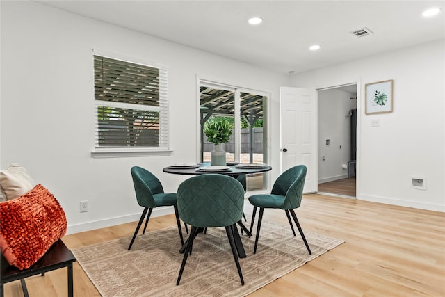 1303 Johns Dr, Euless, TX 76039 - dining room with baseboards, light wood-style floors, and recessed lighting