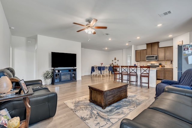 3204 Peacock Ln, Celina, TX 75009 - living area with ceiling fan, light wood-type flooring, and recessed lighting