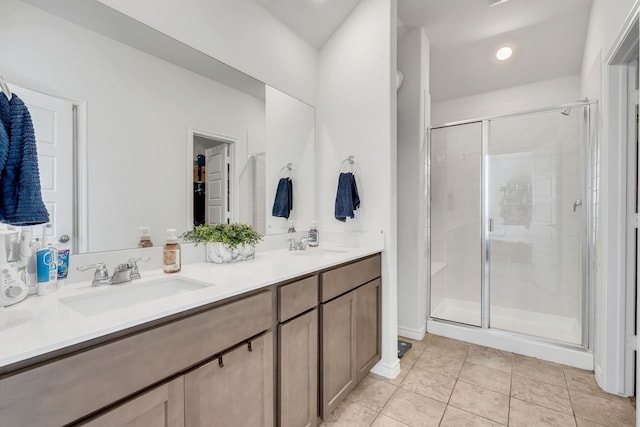 3204 Peacock Ln, Celina, TX 75009 - bathroom featuring double vanity, a shower stall, and tile patterned flooring