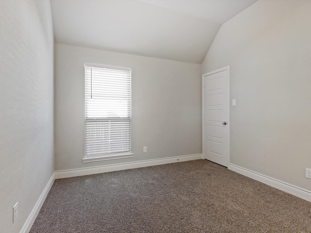 1423 Daisy Corner Dr, Celina, TX 75078 - spare room with lofted ceiling, carpet floors, and baseboards