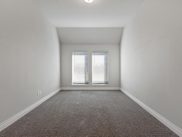 1423 Daisy Corner Dr, Celina, TX 75078 - empty room with carpet floors, baseboards, and vaulted ceiling