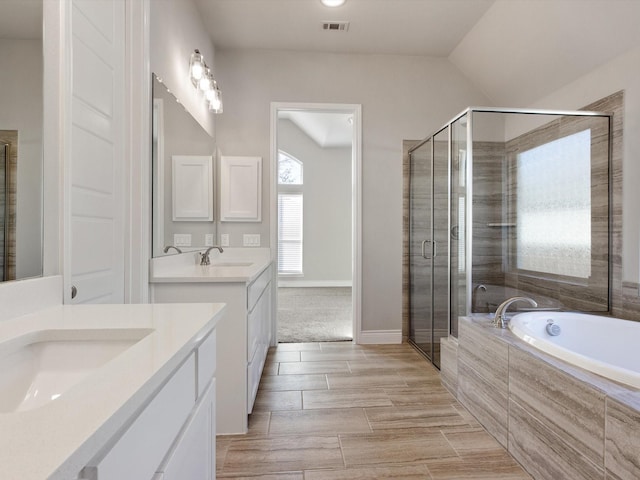 1423 Daisy Corner Dr, Celina, TX 75078 - bathroom with a stall shower, two vanities, a garden tub, and baseboards