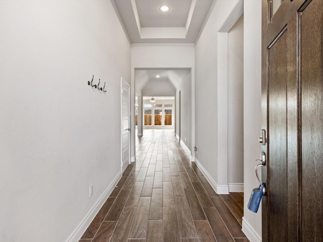 1423 Daisy Corner Dr, Celina, TX 75078 - hall with dark wood-style floors, baseboards, recessed lighting, and a raised ceiling