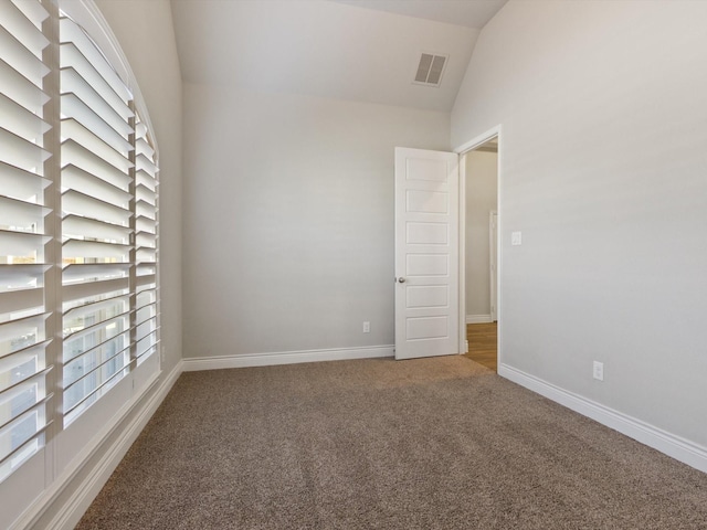 1423 Daisy Corner Dr, Celina, TX 75078 - carpeted empty room featuring vaulted ceiling and baseboards