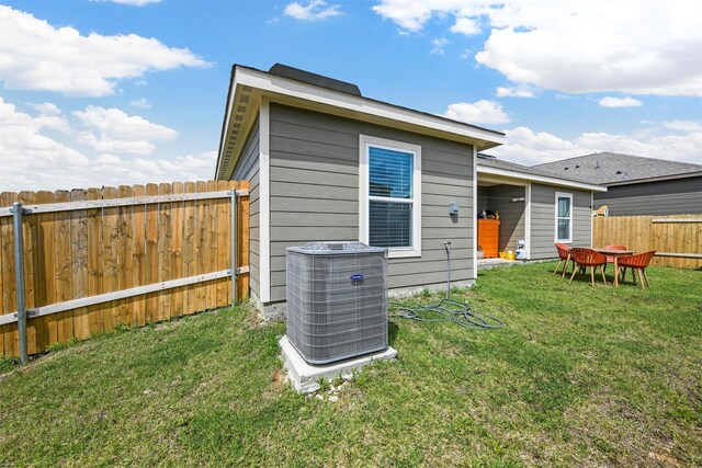 13713 Beaverhead St, Ponder, TX 76259 - back of property with central AC unit