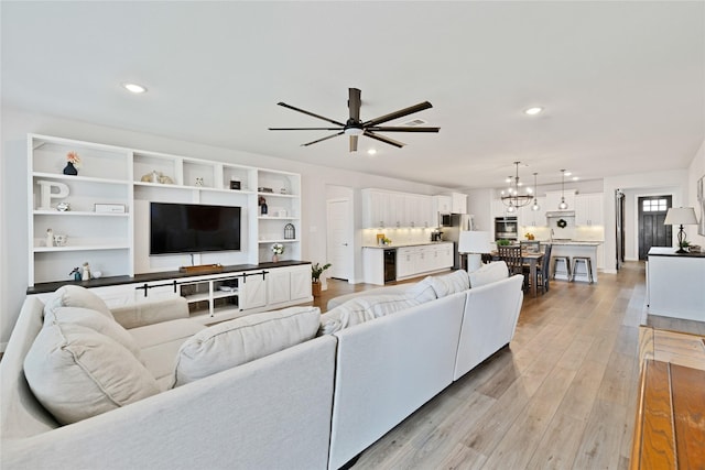 14521 Home Trl, Fort Worth, TX 76262 - living room featuring a chandelier, light wood-style floors, recessed lighting, a ceiling fan, and beverage cooler