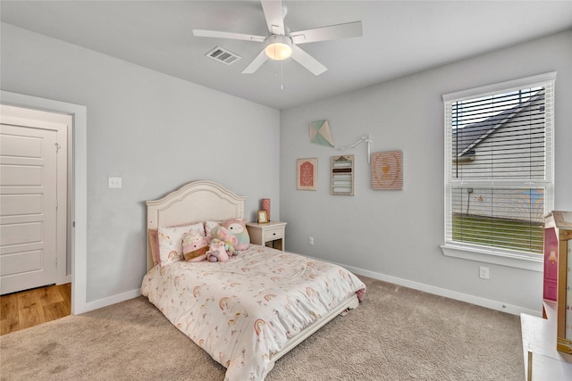 14521 Home Trl, Fort Worth, TX 76262 - bedroom with light colored carpet, baseboards, and ceiling fan