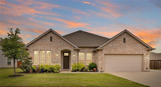 14521 Home Trl, Fort Worth, TX 76262 - view of front of house featuring brick siding, an attached garage, concrete driveway, and a front lawn