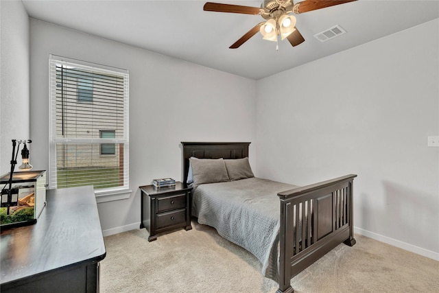 14521 Home Trl, Fort Worth, TX 76262 - bedroom with light carpet, baseboards, and a ceiling fan