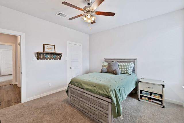 14521 Home Trl, Fort Worth, TX 76262 - carpeted bedroom with baseboards and ceiling fan