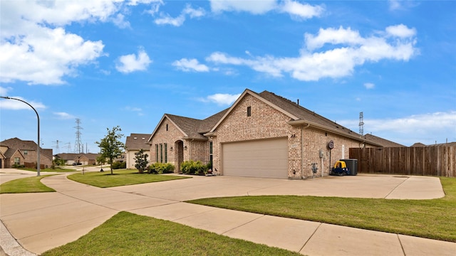 14521 Home Trl, Fort Worth, TX 76262 - view of front of home featuring brick siding, an attached garage, driveway, and central AC