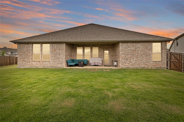 14521 Home Trl, Fort Worth, TX 76262 - rear view of house with an outdoor living space, a patio, brick siding, and roof with shingles