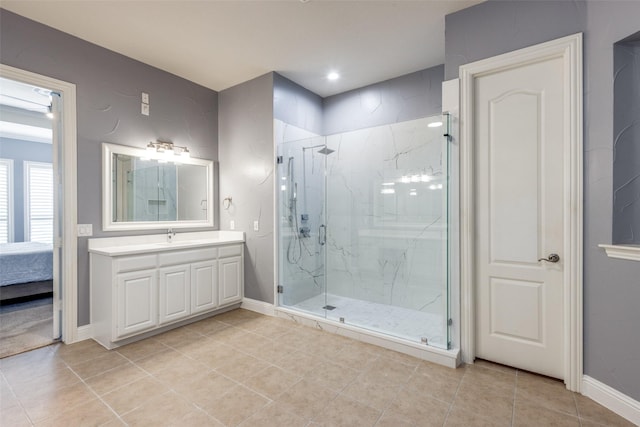 6904 Cross Creek Ln, Mckinney, TX 75072 - bathroom with a marble finish shower, tile patterned flooring, and vanity