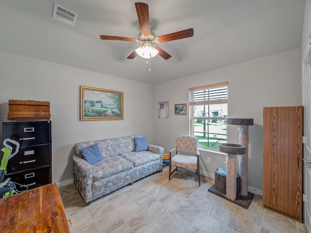 2400 Briarhurst Ct, Denton, TX 76207 - living room featuring a ceiling fan and baseboards