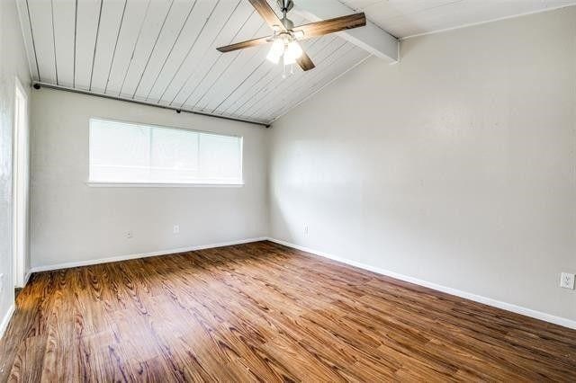 744 Greenhaven Dr, Richardson, TX 75080 - spare room with a ceiling fan, wood finished floors, and baseboards