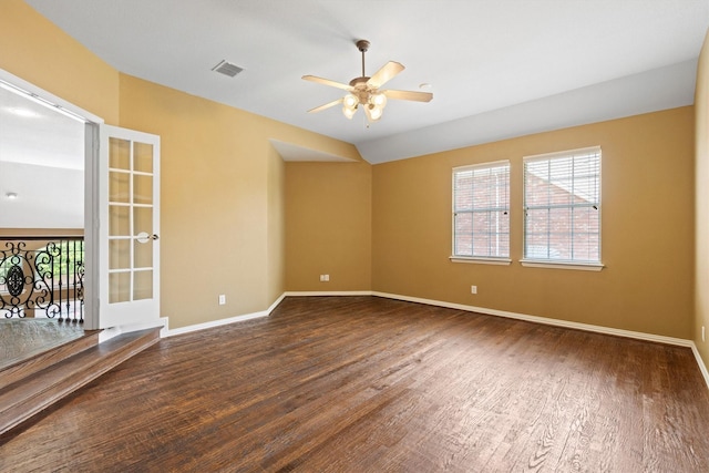 2609 Green Oak Dr, Carrollton, TX 75010 - unfurnished room featuring a ceiling fan, wood finished floors, plenty of natural light, and baseboards