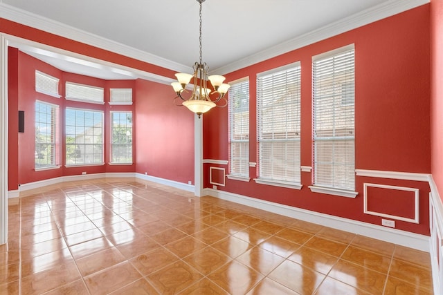 2609 Green Oak Dr, Carrollton, TX 75010 - spare room with a chandelier, light tile patterned floors, baseboards, and ornamental molding