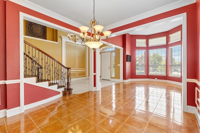 2609 Green Oak Dr, Carrollton, TX 75010 - tiled entryway featuring a chandelier, crown molding, baseboards, and stairs