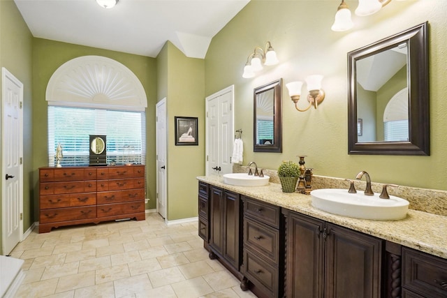 7300 Bishop Ct, Fort Worth, TX 76179 - full bathroom featuring double vanity and baseboards