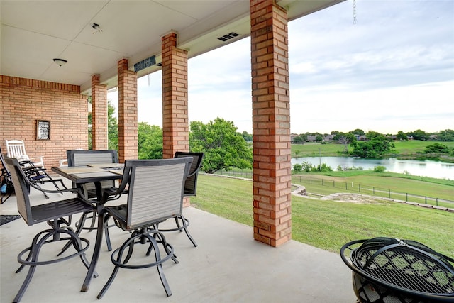 7300 Bishop Ct, Fort Worth, TX 76179 - view of patio with a water view and outdoor dining area