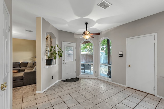 533 Cameron Ln, Allen, TX 75002 - foyer entrance with ceiling fan, light tile patterned floors, and baseboards