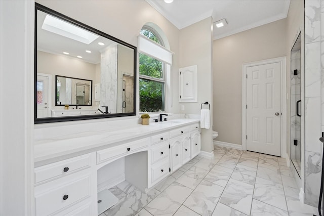 bathroom with a shower stall, toilet, vanity, marble look tile flooring, and crown molding