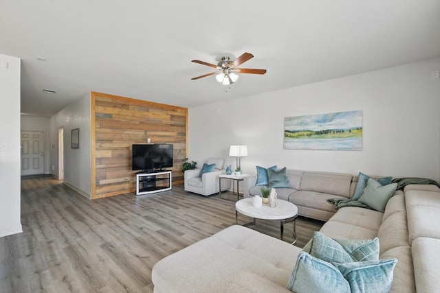 4800 Blue Top Dr, Fort Worth, TX 76179 - living area featuring a ceiling fan, wood finished floors, and baseboards