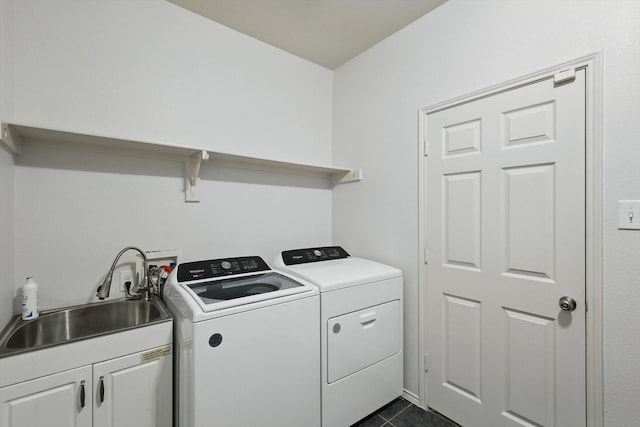 4800 Blue Top Dr, Fort Worth, TX 76179 - washroom with cabinet space, washing machine and clothes dryer, and dark tile patterned flooring