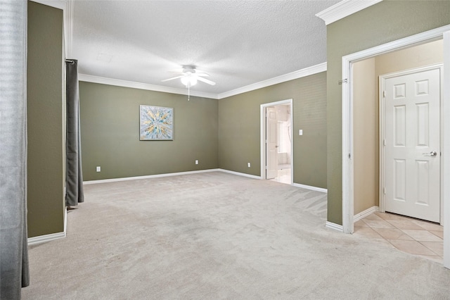 6748 Bastille Dr, Plano, TX 75024 - unfurnished bedroom featuring carpet flooring, crown molding, a textured ceiling, baseboards, and ensuite bath