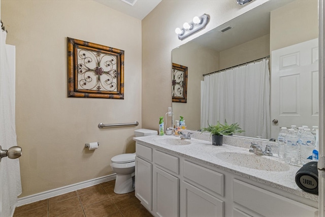 503 Sundrop Dr, Fate, TX 75132 - full bath with toilet, tile patterned floors, baseboards, and double vanity
