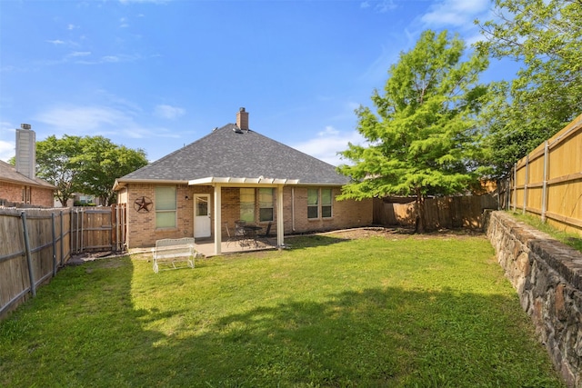 503 Sundrop Dr, Fate, TX 75132 - rear view of property featuring brick siding, a patio, roof with shingles, and a pergola