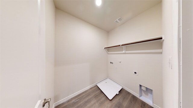 2045 Juniper Pass Way, Mesquite, TX 75149 - laundry area with hookup for an electric dryer, gas dryer hookup, wood finished floors, baseboards, and washer hookup