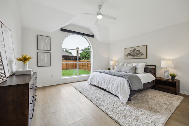 12306 Ark Rd, Frisco, TX 75035 - bedroom with vaulted ceiling, light wood-style flooring, baseboards, and a ceiling fan