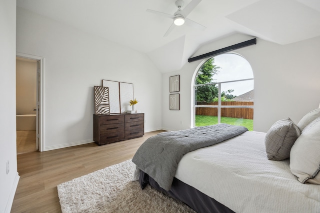 12306 Ark Rd, Frisco, TX 75035 - bedroom with wood finished floors, baseboards, access to outside, ceiling fan, and vaulted ceiling