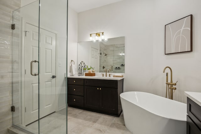 12306 Ark Rd, Frisco, TX 75035 - full bathroom featuring a shower stall, vanity, and a freestanding bath