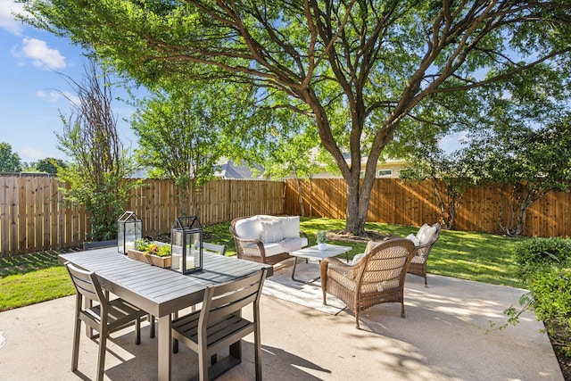 12306 Ark Rd, Frisco, TX 75035 - view of patio / terrace with an outdoor living space, a fenced backyard, and outdoor dining area