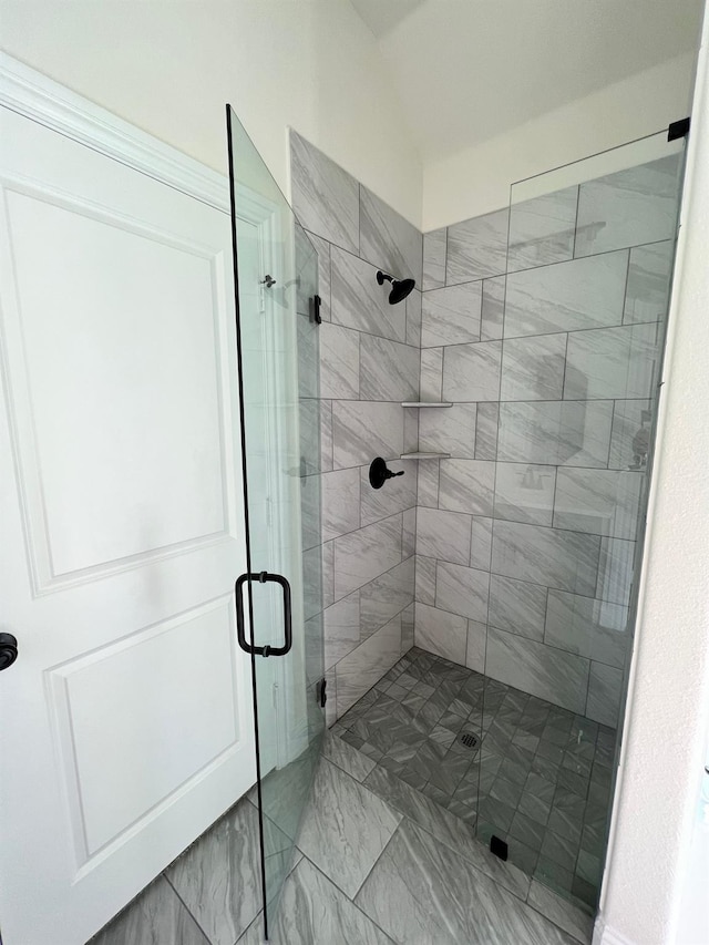 full bathroom featuring a stall shower