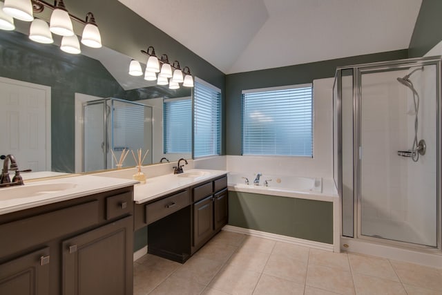 bathroom with vaulted ceiling, a stall shower, tile patterned flooring, double vanity, and a bath