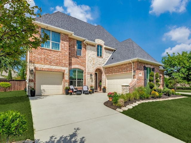 4400 Bristleleaf Ln, Prosper, TX 75078 - french provincial home with driveway, a shingled roof, brick siding, stone siding, and a garage