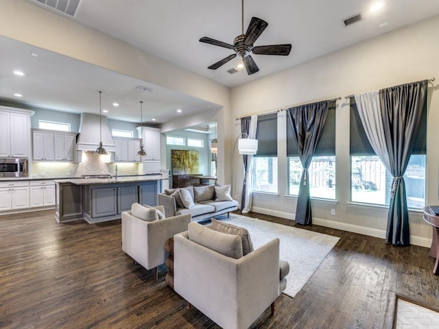 4400 Bristleleaf Ln, Prosper, TX 75078 - living room with dark wood-type flooring, recessed lighting, a ceiling fan, and baseboards