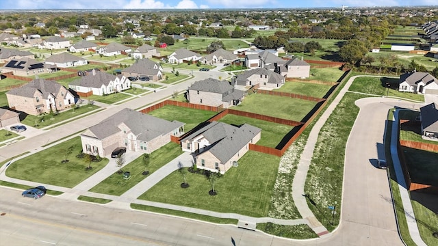 aerial view of property's location with nearby suburban area