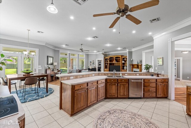 309 Slate Cir, Haughton, LA 71037 - kitchen featuring a ceiling fan, open floor plan, light countertops, stainless steel dishwasher, and crown molding