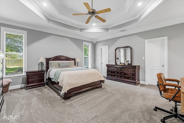 309 Slate Cir, Haughton, LA 71037 - carpeted bedroom with multiple windows, a tray ceiling, ornamental molding, baseboards, and ceiling fan