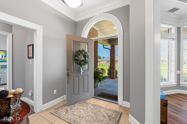 309 Slate Cir, Haughton, LA 71037 - entryway featuring ornamental molding, baseboards, and light tile patterned floors