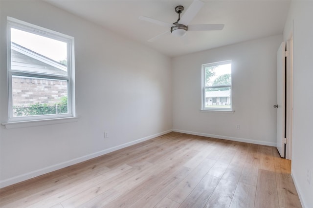 424 Stonewall Dr, Euless, TX 76039 - unfurnished room with light wood-style flooring, baseboards, and a ceiling fan