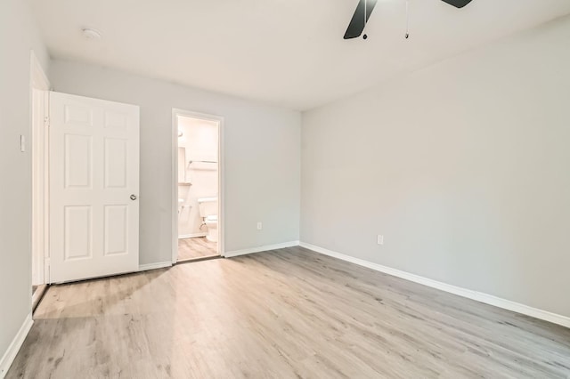 7805 Whitney Dr, White Settlement, TX 76108 - unfurnished bedroom featuring light wood finished floors, baseboards, and connected bathroom