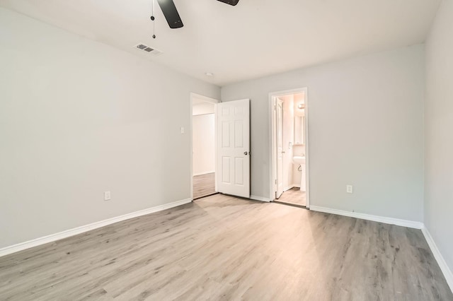 7805 Whitney Dr, White Settlement, TX 76108 - unfurnished bedroom with light wood-style flooring, baseboards, connected bathroom, and a ceiling fan